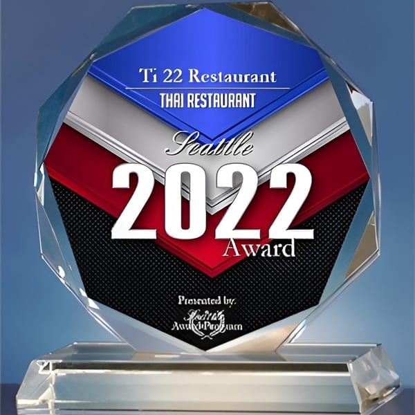 Ti 22 Restaurant Thai Restaurant Seattle 2022 Award, a crystal trophy with blue, red, and black accents.